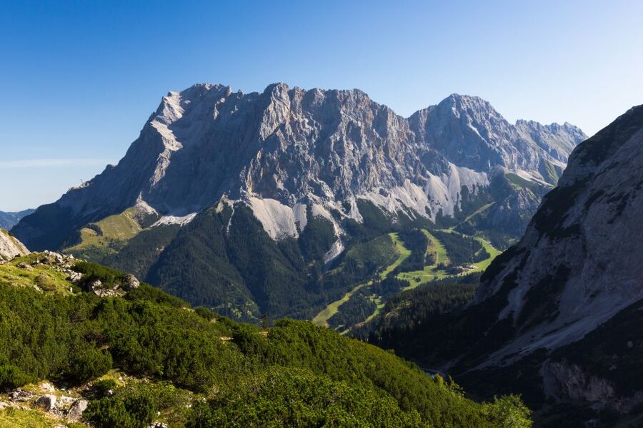 From Munich: Zugspitze Mountain Van Tour with Garmisch Town - Zugspitze Summit: The Border-Mountain Detail That Makes It Fun