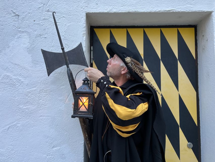 Munich: Night Watchman Walking Tour - Altes Rathaus on Salzstraße, the gate site, and piety jokes