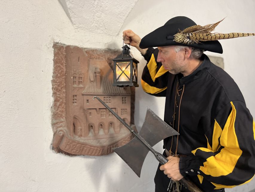 Munich: Night Watchman Walking Tour - City walls and Gruftgasse, where a ring becomes a plot