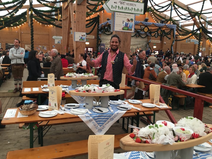 Munich Oktoberfest All-Inclusive Tour - Your reserved balcony inside the tent: feast setup and 2 liters of beer