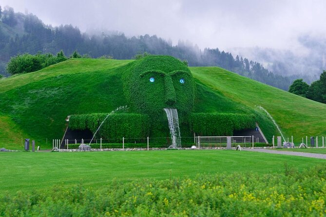 MY <em> GUiDE EXCLUSiVE PANORAMA alpine tour to INNSBRUCK (/ Swarovski) from Munich – Key highlights to know before you go’ /></p>
<ul>
<li><strong>Panoramic VW Comfort Van ride</strong> with air conditioning, safety features, and comfy leather interior</li>
<li><strong>Innsbruck guided walk</strong> with the Golden Roof and major sights in about 35 minutes of guided touring</li>
<li><strong>Nordkettenbahnen cable car options</strong> plus views from Hungerburg and Seegrube (tickets cost extra)</li>
<li><strong>Bergisel ski jump</strong> stop area with modern Zaha Hadid architecture (tower designed by Zaha Hadid)</li>
<li><strong>Swarovski Kristallwelten</strong> visit focused on art and design, not a factory tour</li>
<li><strong>Bavarian-to-Tyrol route with lake stops</strong> at Tegernsee and Achensee</li>
</ul>
<h2>A panoramic Alpine day that strings together Bavaria and Tyrol</h2>
<p><img width="669" height="446" decoding="async" src=