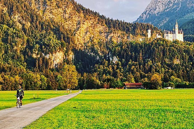 Neuschwanstein Castle by Bus Incl. Bike Ride or Hohenschwangau - Schwansee lake time, swim optional and photos built in