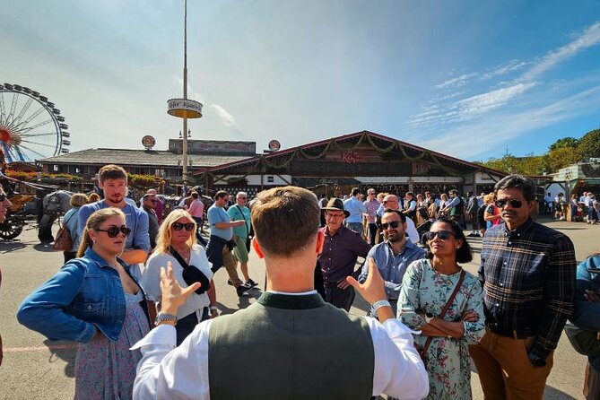 Oktoberfest Experience in Munich: Fun, Food, Beer & Seats - Stop inside the fairgrounds: sights, tent names, and quick insider context
