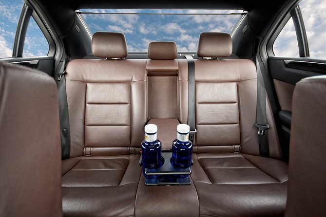 Private Departure Transfer from Munich to Munich Airport by Sedan - The ride itself: Mercedes E-Class comfort and a very practical onboard setup